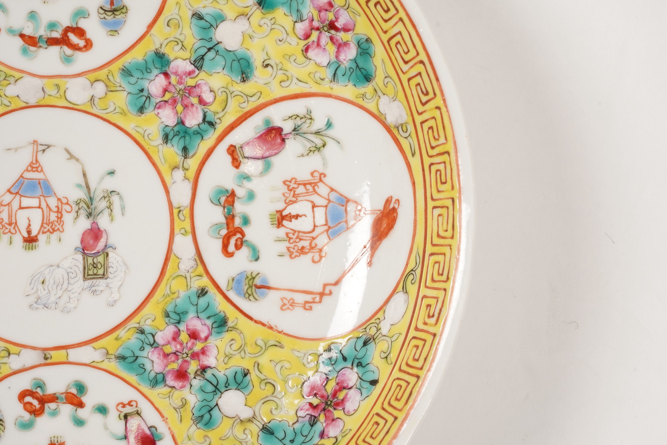 A pair of Chinese yellow ground medallion saucer dishes, Guangxu six character marks, early 20th century